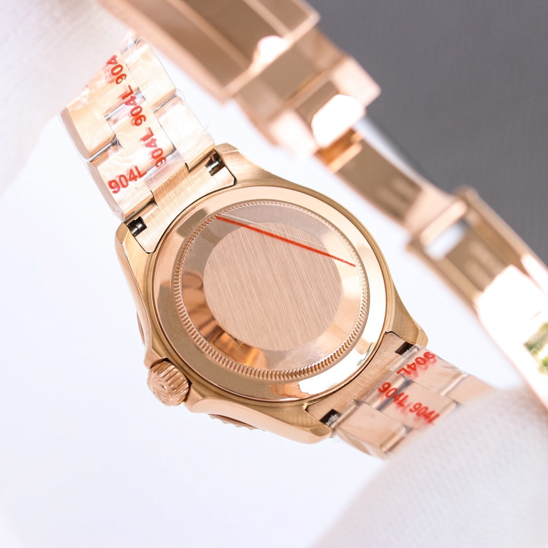 Rolex watch caseback in rose-gold tone with textured center plate and visible screws.