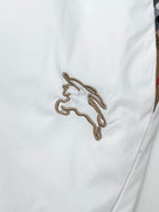 Burberry white shorts with embroidered horse logo on the front