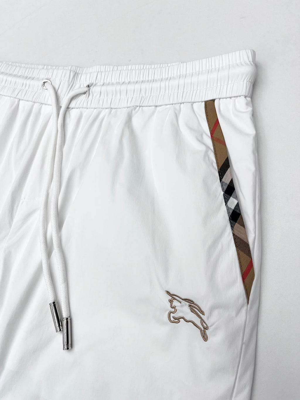 Burberry white shorts with drawstring waistband, logo and side stripe