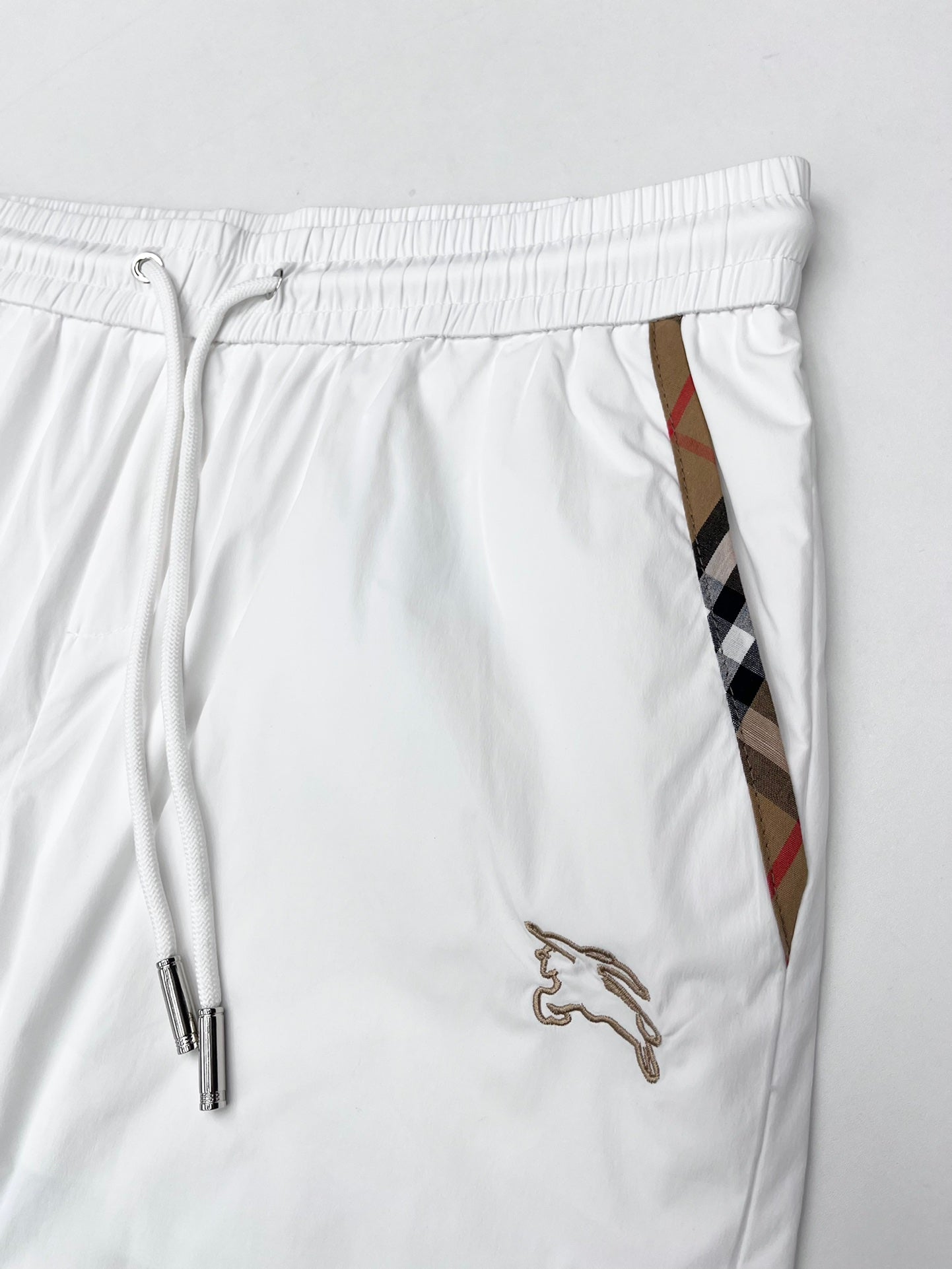 Burberry white shorts with drawstring waistband, logo and side stripe