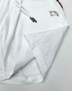 Burberry white shorts with drawstring ends and stitched pocket at the hem