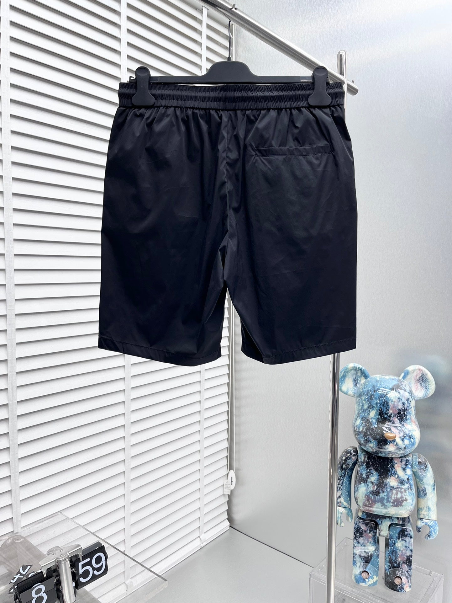 Dark navy Burberry shorts with elastic waistband and drawstring, relaxed fit