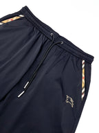 Dark navy Burberry shorts waistband with drawstring and small logo on side