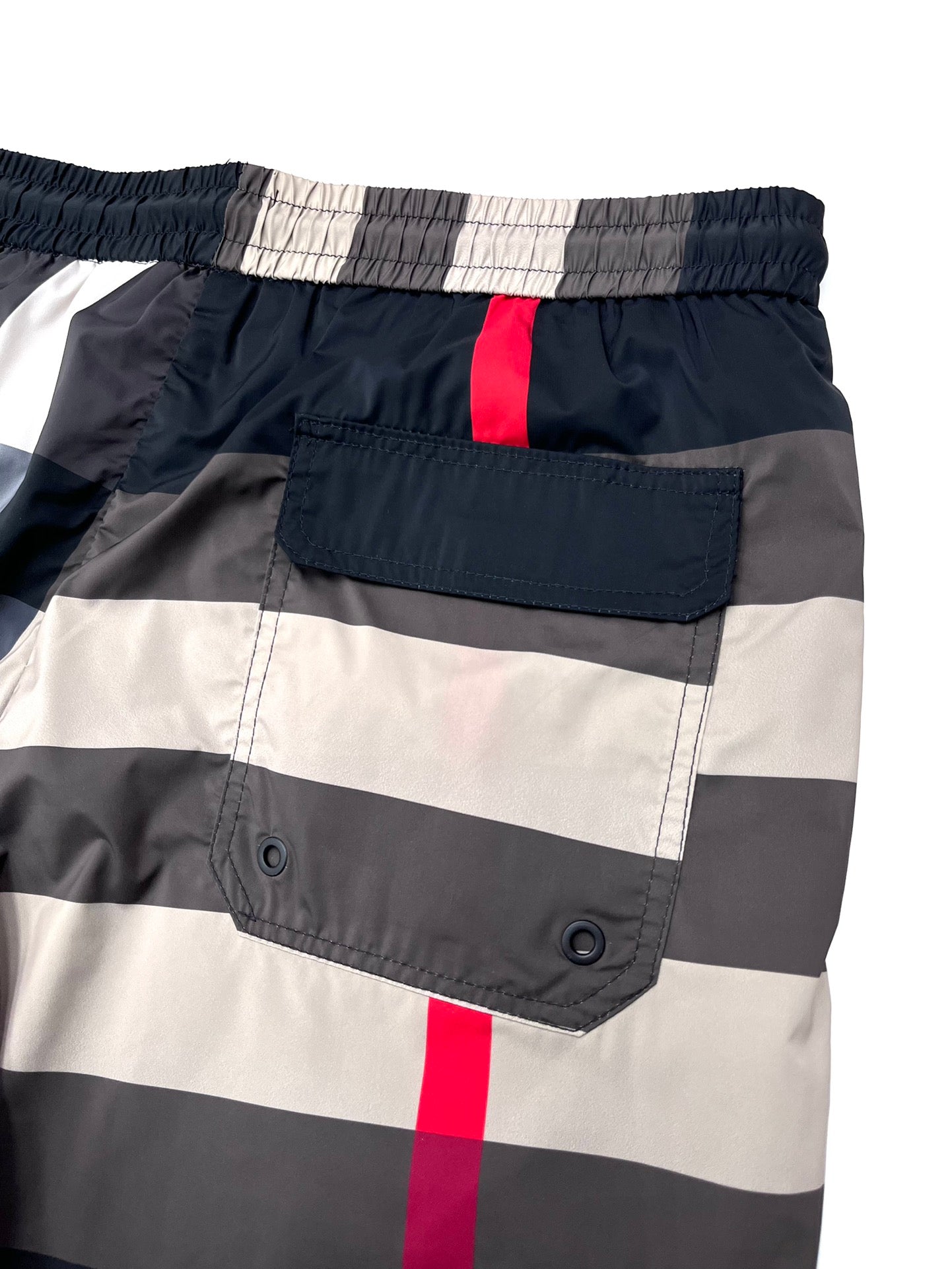 Burberry check shorts back pocket detail with elastic waistband and red plaid stripe