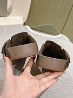 Balenciaga sandals interior view with beige lining and dark brown glitter straps
