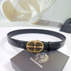 Black leather belt with ornate gold oval buckle and adjustable holes.