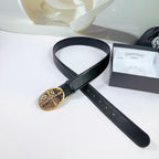 Black leather belt with gold oval buckle, shown at an angle with strap holes.