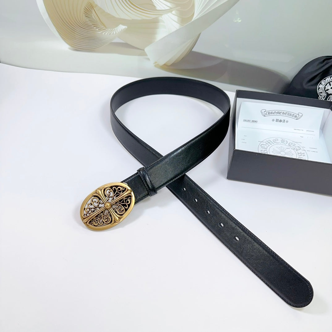 Black leather belt with gold oval buckle, shown at an angle with strap holes.