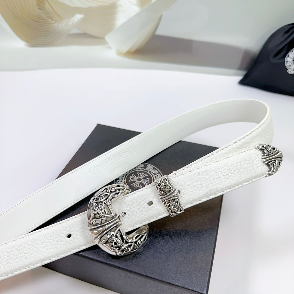 White leather belt with silver filigree buckle and ornate patterned center plate
