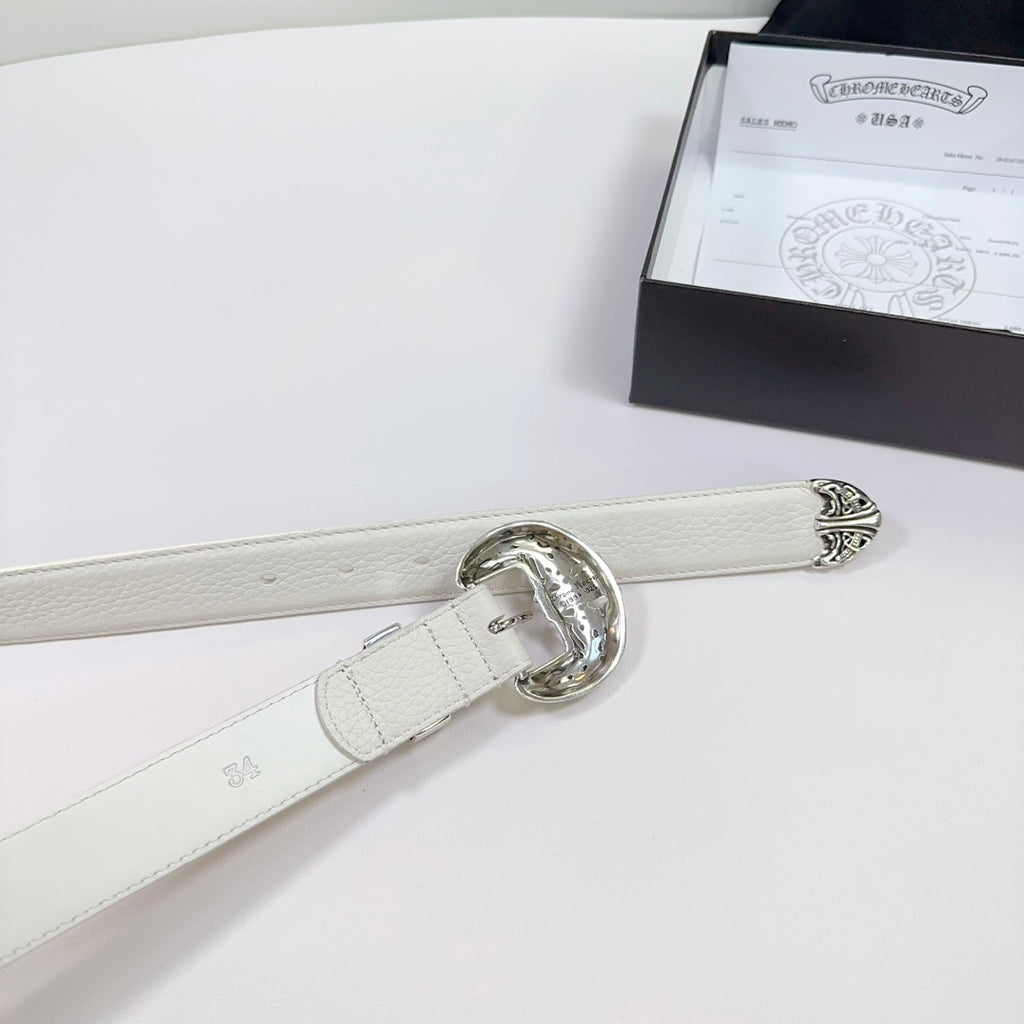 White leather belt with oval silver buckle and adjustable strap with small engraved marks