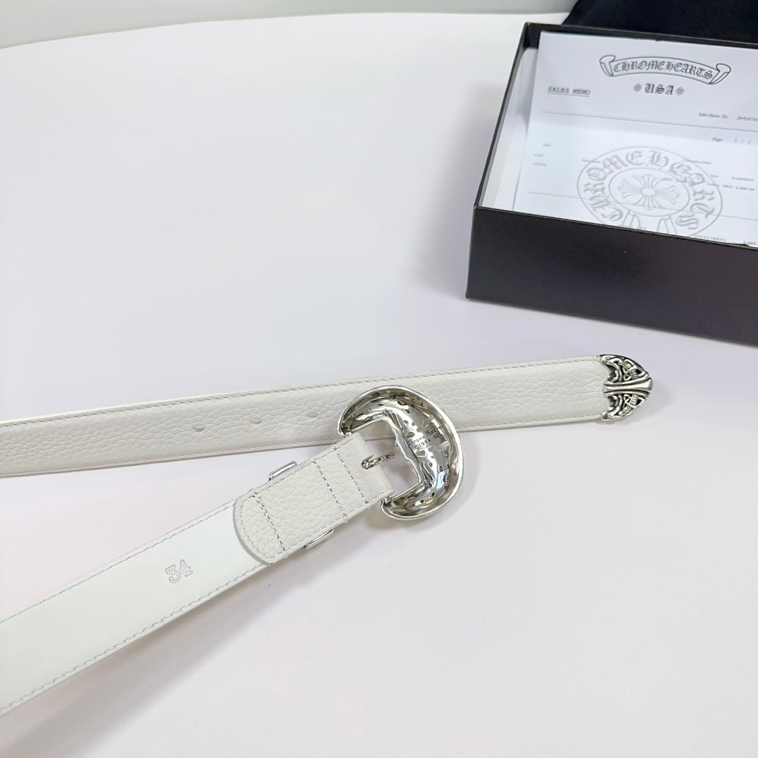 White leather belt with oval silver buckle and adjustable strap with small engraved marks