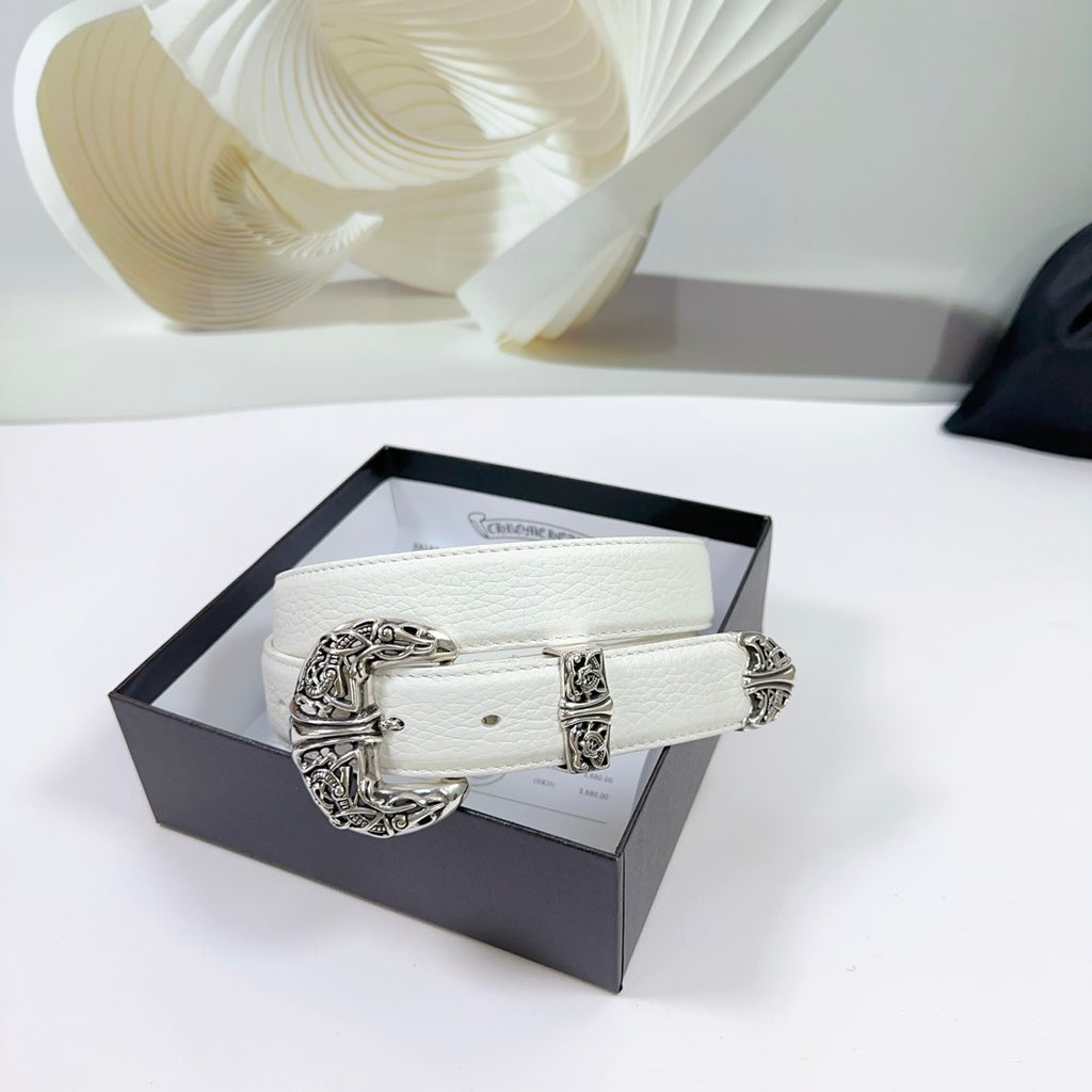 White leather belt in box with ornate silver buckle and decorative side filigree