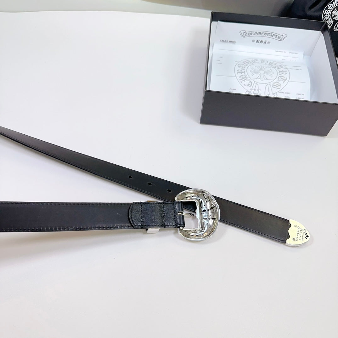 Black leather belt with large circular silver buckle and adjustable strap holes