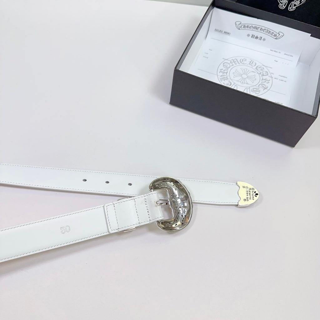 White leather belt end with round ornate silver buckle and hanging size tag