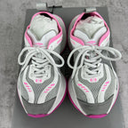 Balenciaga lace-up sneakers, front view with gray mesh toe and pink-trimmed collar