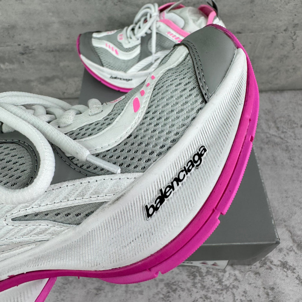 Balenciaga sneaker side profile with gray mesh panels and pink edge detail, lace-up