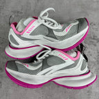 Balenciaga unisex sneakers pair, side view with white/gray uppers and pink rubber edge