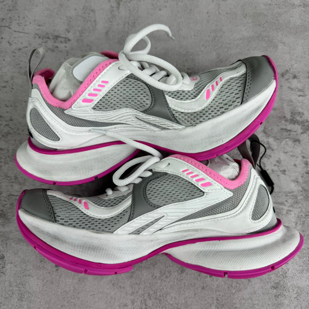 Balenciaga unisex sneakers pair, side view with white/gray uppers and pink rubber edge