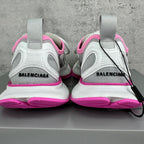 Balenciaga sneakers heel view with “BALENCIAGA” on back, white upper and pink trim