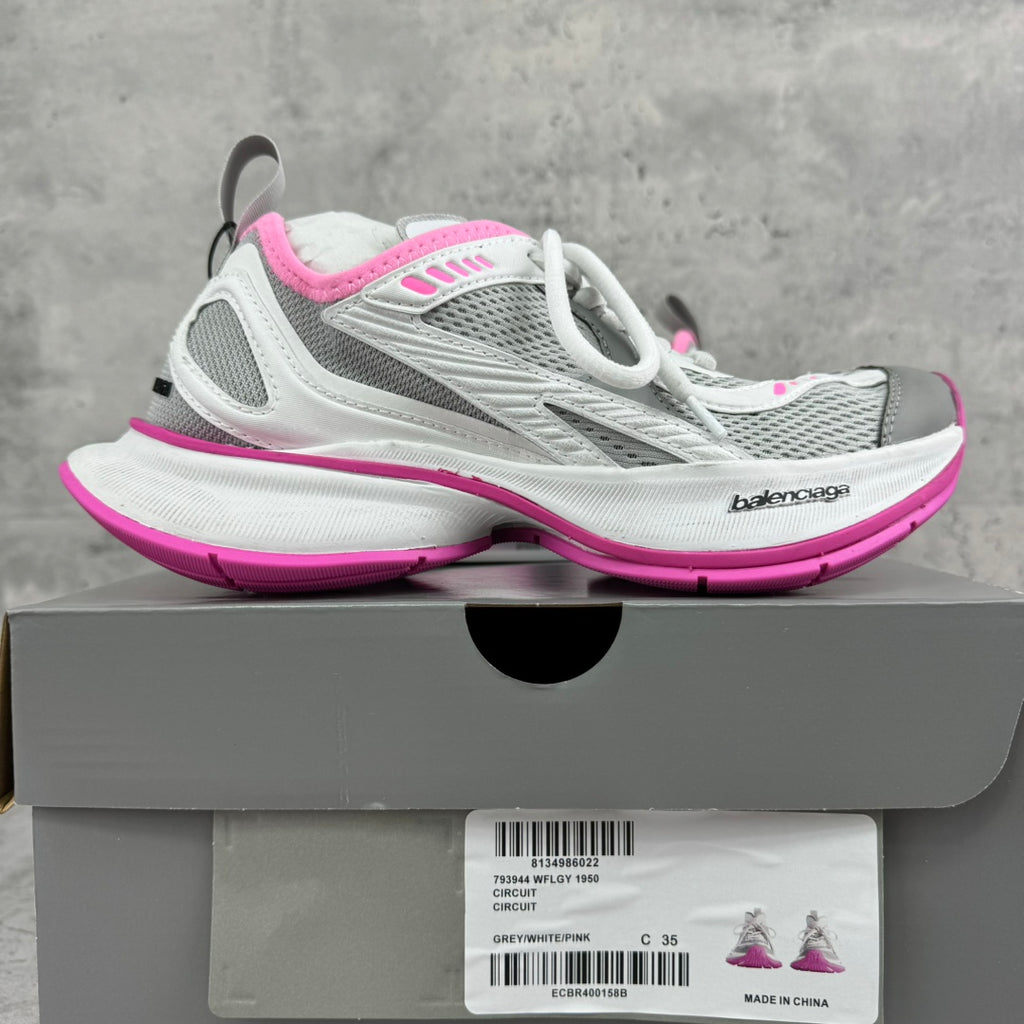Balenciaga lace-up sneakers in white and gray with pink soles, shown on box