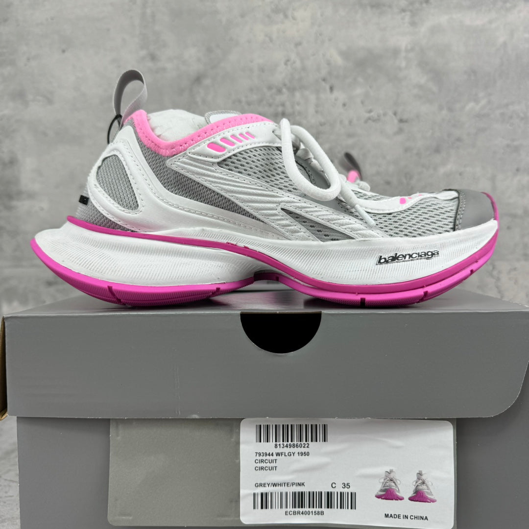 Balenciaga lace-up sneakers in white and gray with pink soles, shown on box