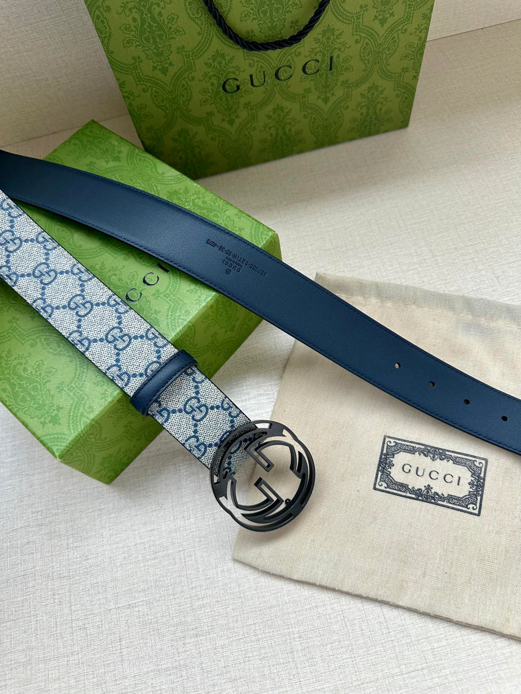 Gucci belt with blue GG canvas and dark blue leather strap, silver interlocking G buckle