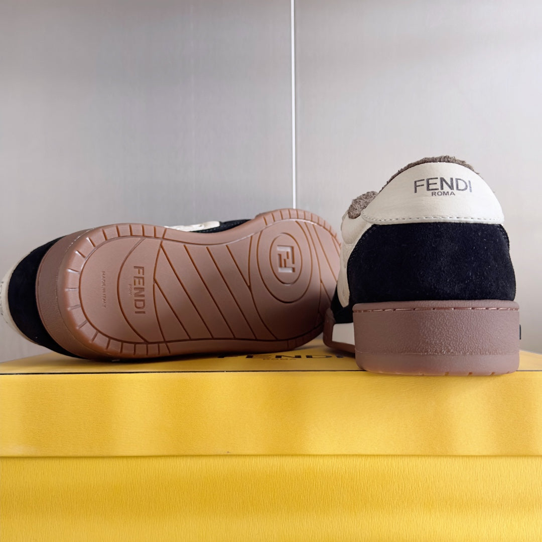 Low-top sneaker outsole view, brown rubber sole with FENDI on heel and toe