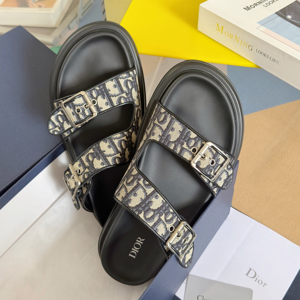 Black Dior slide sandals with two Dior Oblique strap bands and silver buckles