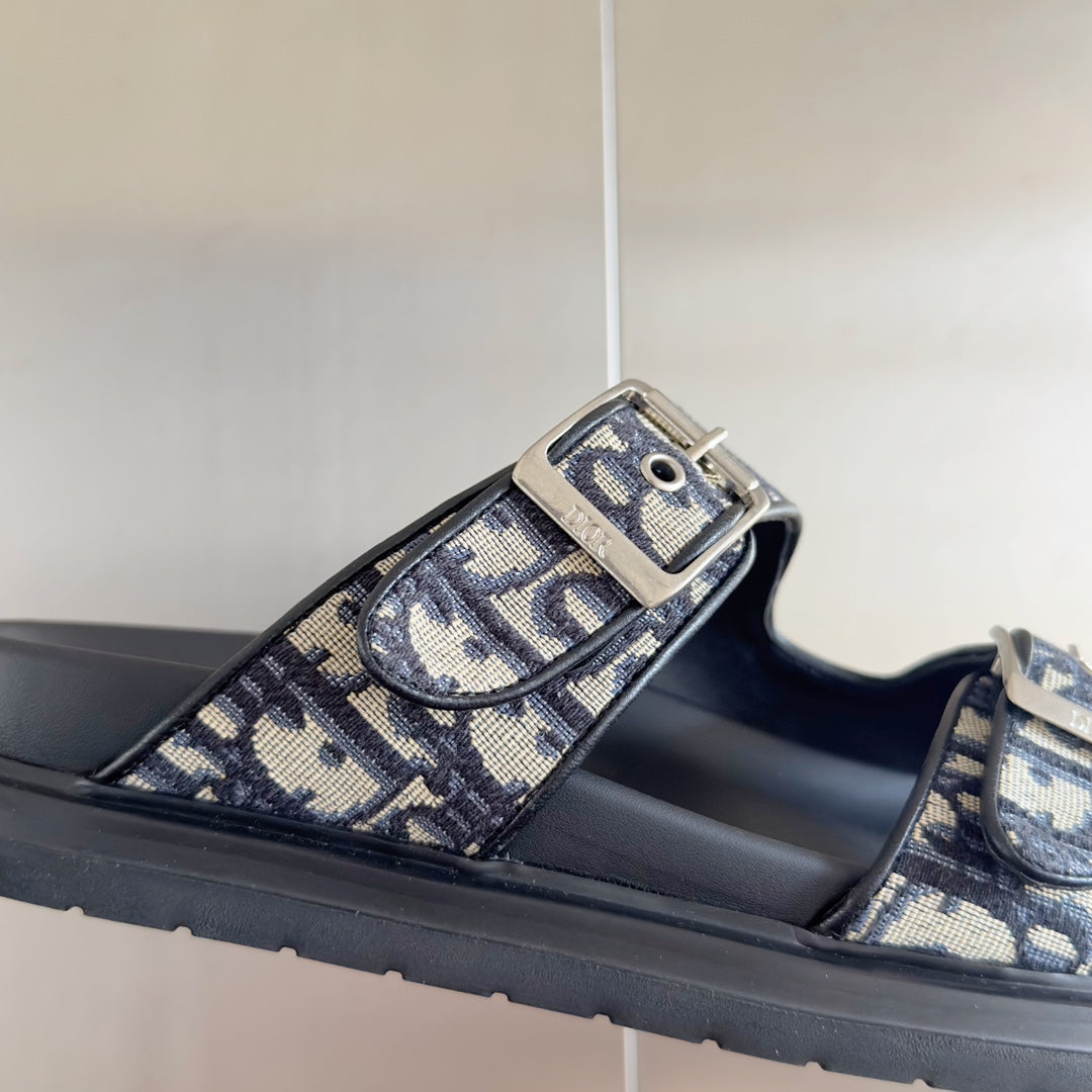 Black Dior slide sandal with Dior Oblique strap, silver buckle and thick sole