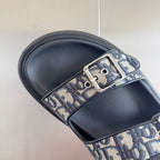 Black Dior slide sandal with Dior Oblique strap and silver metal buckle detail