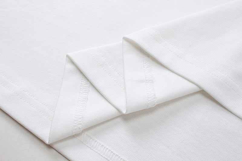 White Gucci T-shirt sleeve cuff and side seam detail