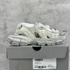 Balenciaga unisex sneakers on a box, light gray uppers with strap closures