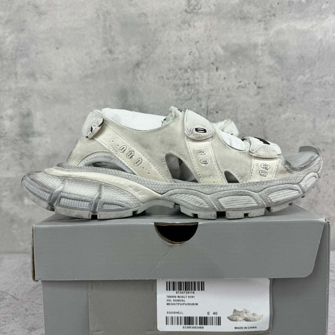 Balenciaga unisex sneakers on a box, light gray uppers with strap closures