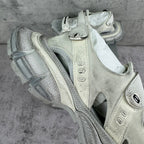 Balenciaga unisex low-top sneaker, light gray leather upper with side cutouts