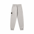 Light gray sweatpants with elastic waist and side pocket detail