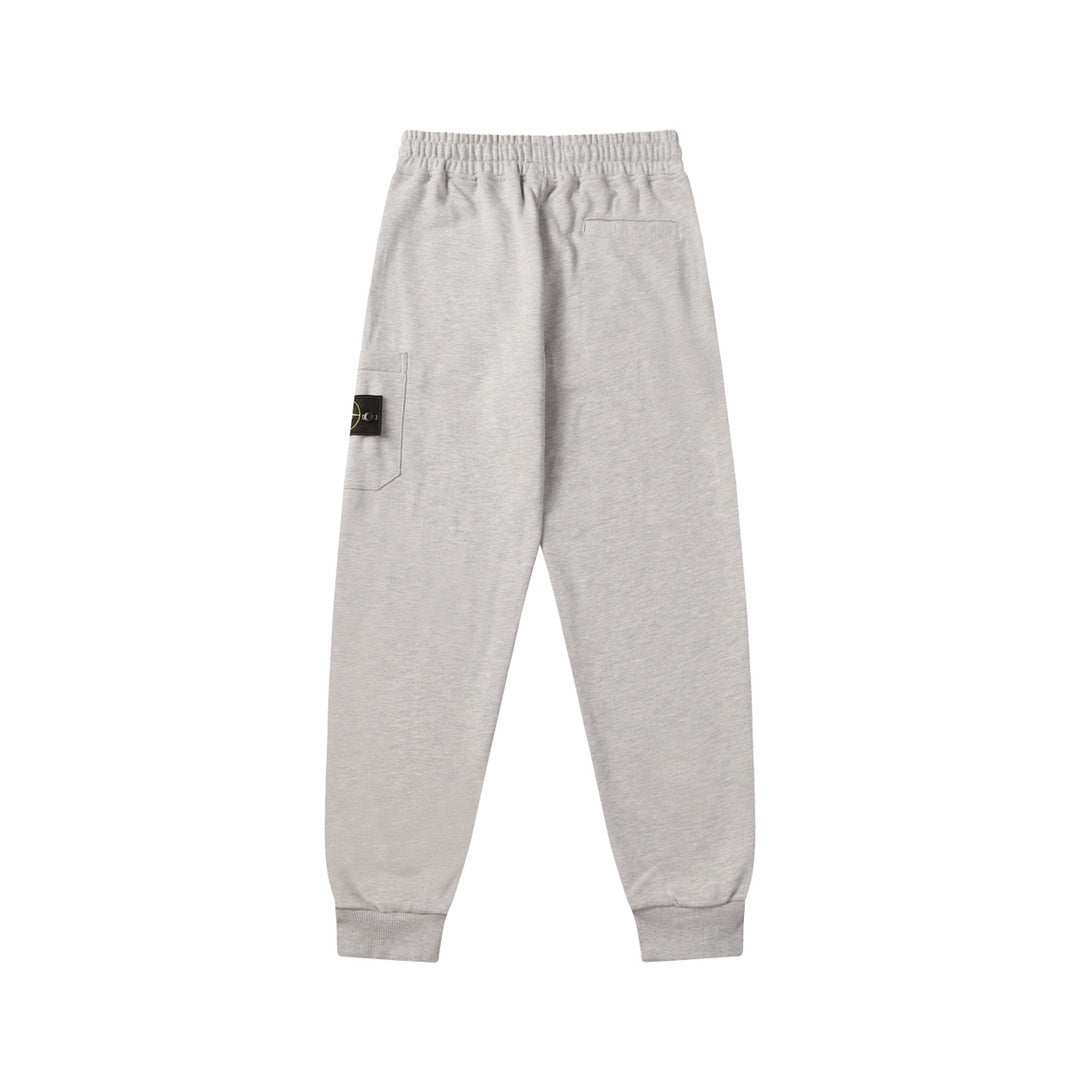 Light gray sweatpants with elastic waist and side pocket detail
