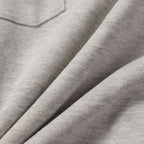 Heather gray knit fabric with ribbed texture