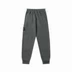 Charcoal gray track pants with side pocket and cargo patch on thigh, cuffed hem