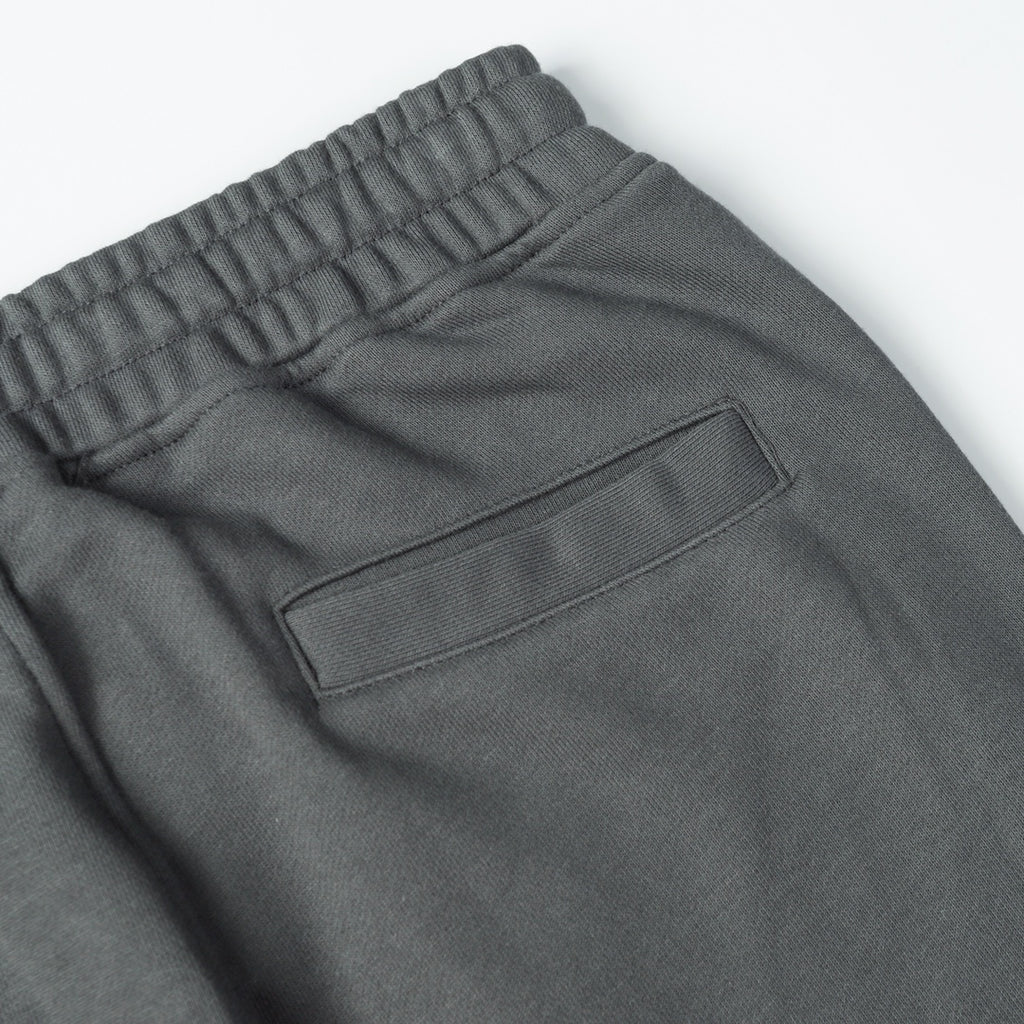 Charcoal gray sweatpants with elastic waistband and rear patch pocket