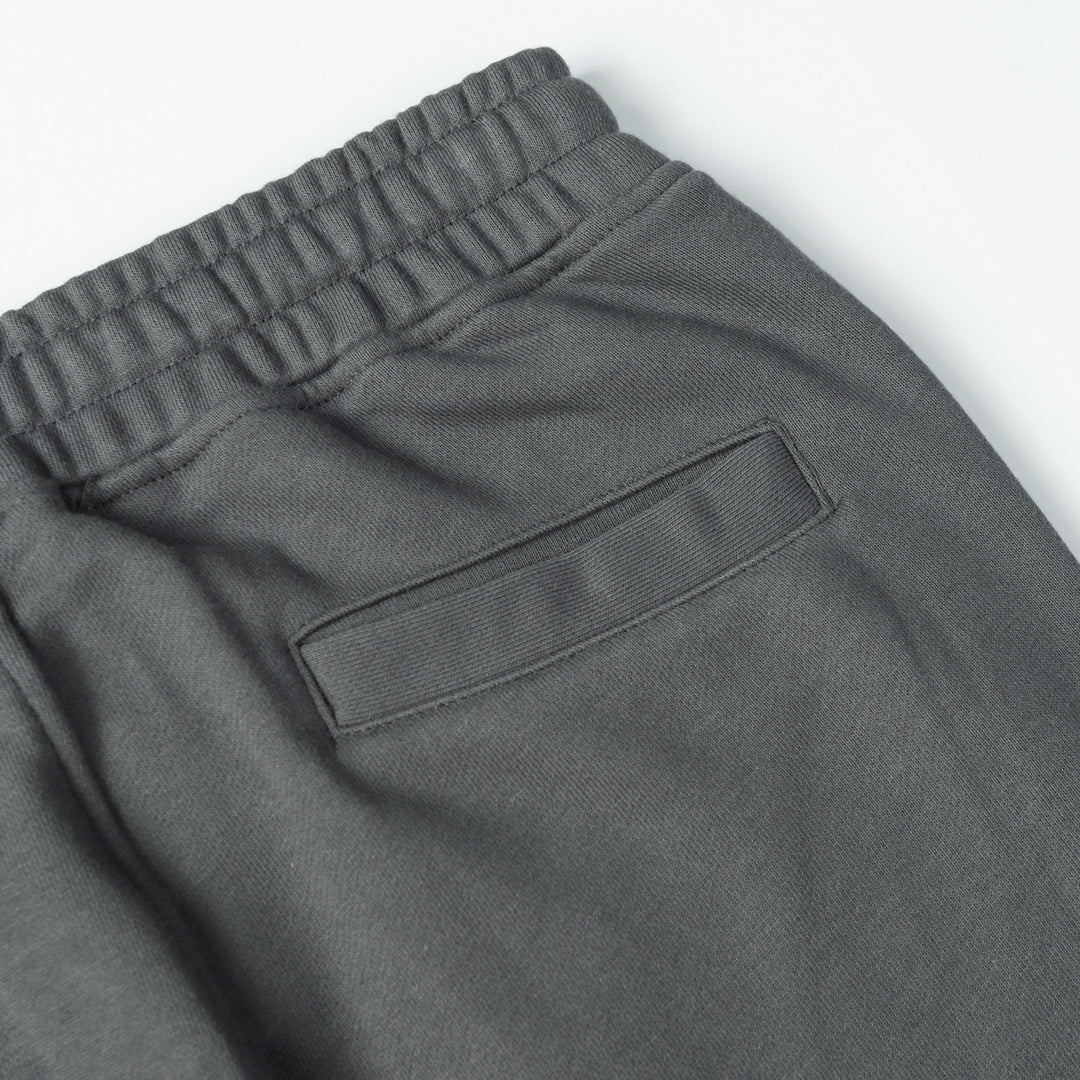 Charcoal gray sweatpants with elastic waistband and rear patch pocket