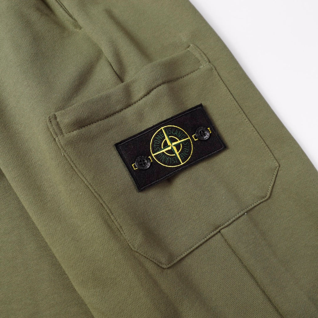 Olive cargo joggers with stitched pocket and Stone Island patch