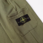 Olive cargo joggers with stitched pocket and Stone Island patch