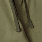 Stone Island olive hoodie drawstring ends and ribbed hood trim