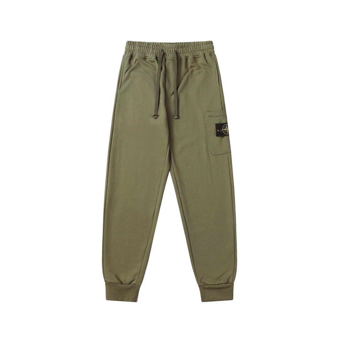 Olive drawstring cargo joggers with tapered legs and ribbed ankle cuffs