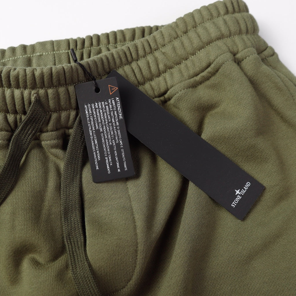 Olive joggers waistband with drawcord and two hang tags