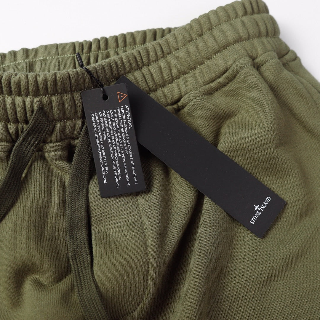Olive joggers waistband with drawcord and two hang tags