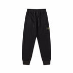 Stone Island black jogger pants with drawstring and side pockets
