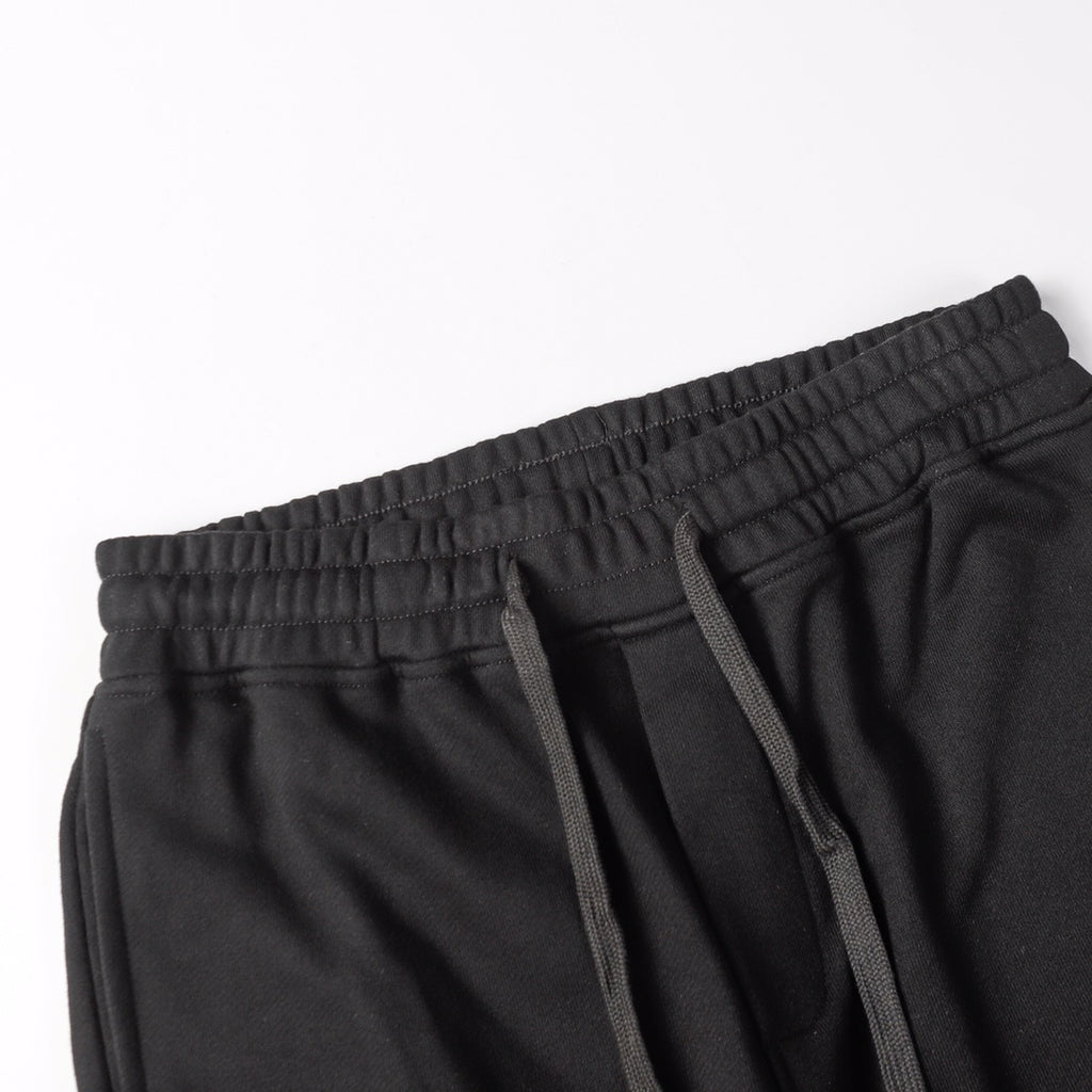 Stone Island black jogger pants with elastic waistband and drawstring
