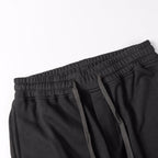 Stone Island black jogger pants with elastic waistband and drawstring
