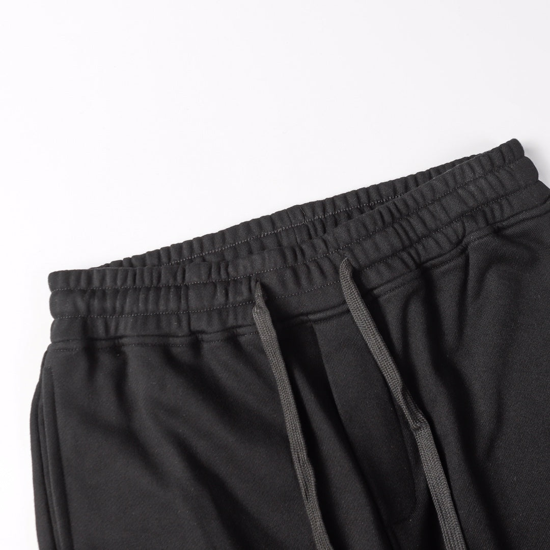 Stone Island black jogger pants with elastic waistband and drawstring